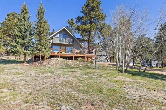 377 Homestead Rd, Bailey, CO 80421 - rear view of property with a deck and a lawn