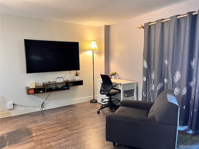 11646 Pearl St, Northglenn, CO 80233 - office area featuring wood finished floors and a textured ceiling