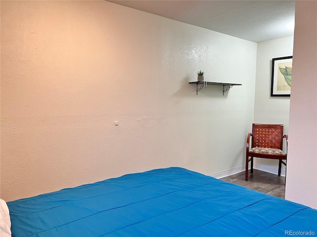 11646 Pearl St, Northglenn, CO 80233 - bedroom featuring wood finished floors and baseboards