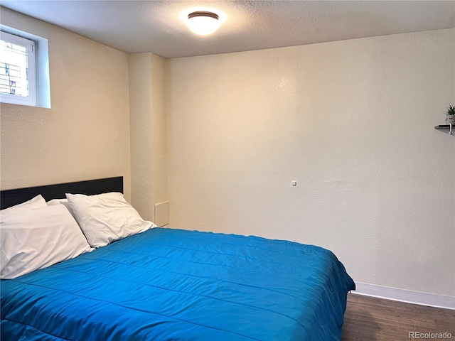 11646 Pearl St, Northglenn, CO 80233 - bedroom featuring wood finished floors and baseboards