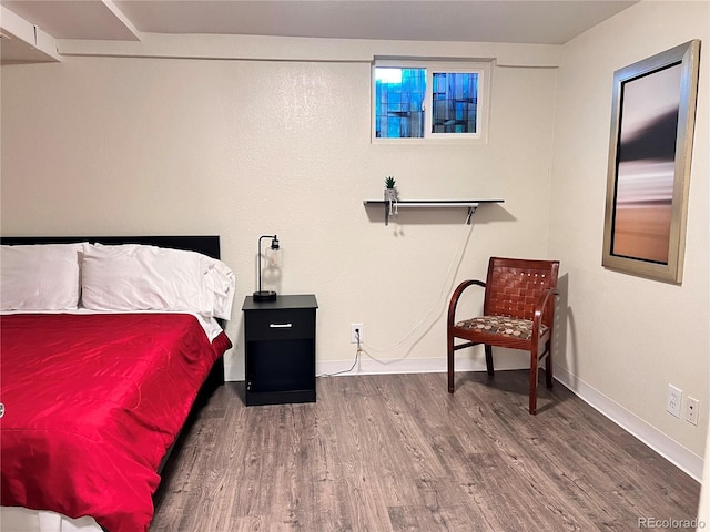 11646 Pearl St, Northglenn, CO 80233 - bedroom with wood finished floors and baseboards