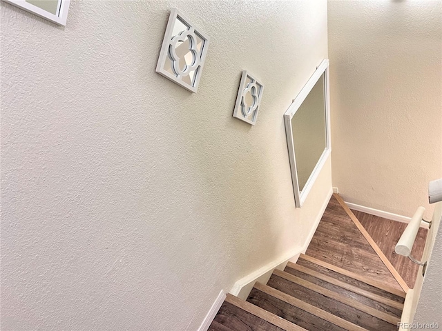 11646 Pearl St, Northglenn, CO 80233 - staircase featuring wood finished floors