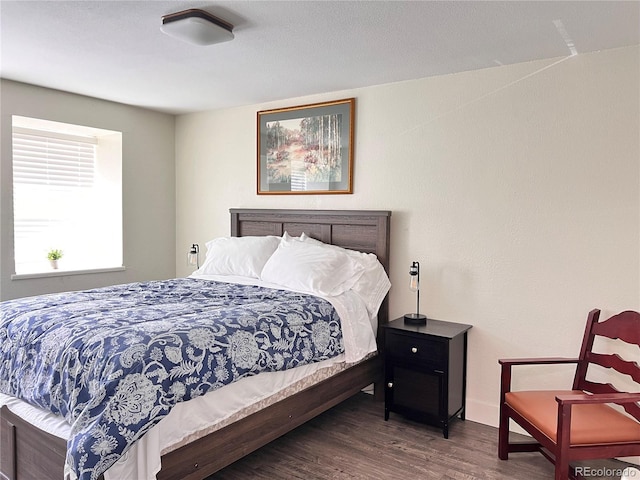 11646 Pearl St, Northglenn, CO 80233 - bedroom with wood finished floors and baseboards