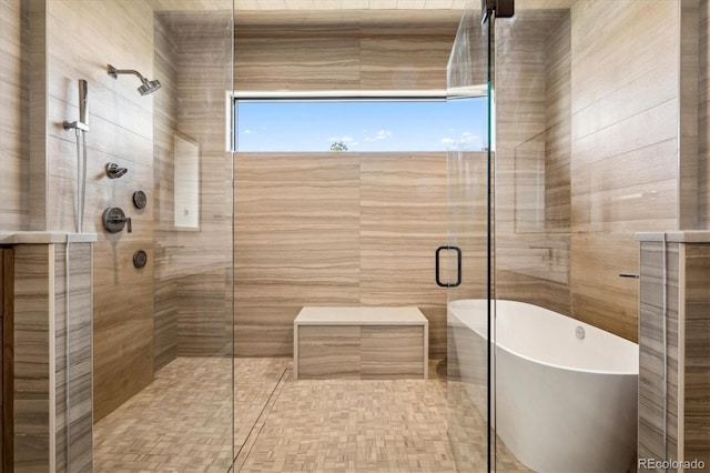 bathroom featuring plus walk in shower