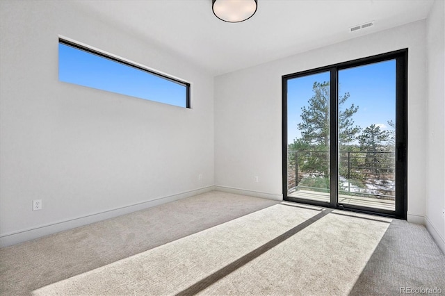 view of carpeted spare room