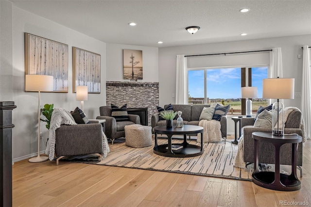 13410 New Ranch Dr, Peyton, CO 80831 - living area featuring wood-type flooring and recessed lighting