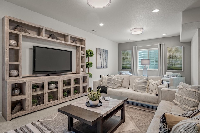 13410 New Ranch Dr, Peyton, CO 80831 - living room featuring recessed lighting, carpet, and a textured ceiling