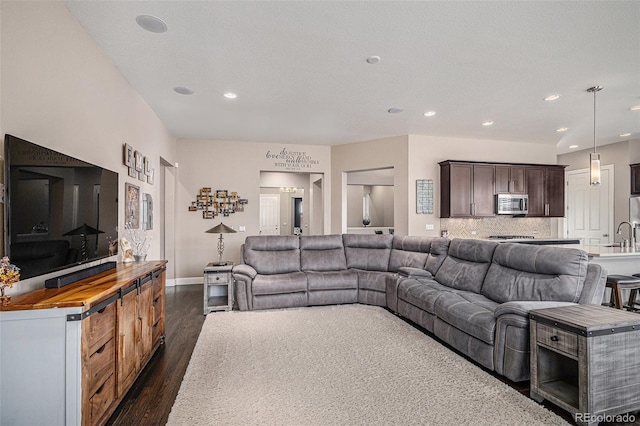 living room with dark wood-type flooring