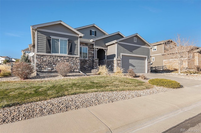 view of front of house with a garage and a front yard