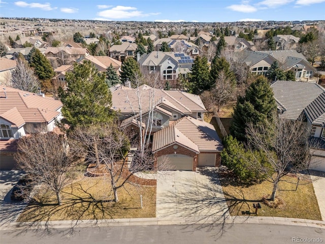 birds eye view of property with a residential view