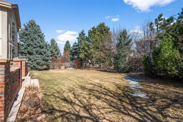 view of yard with fence