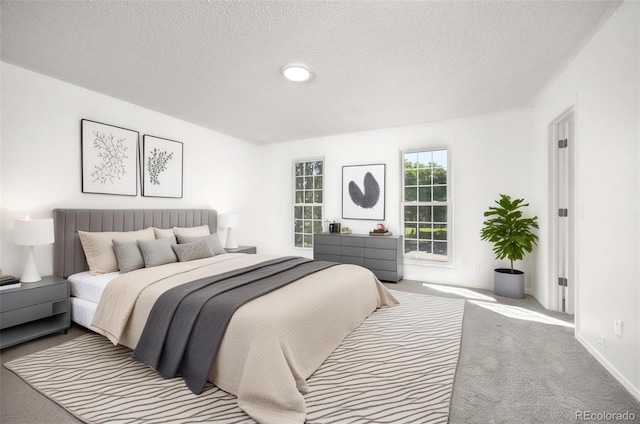 18527 E Kansas Pl, Aurora, CO 80017 - carpeted bedroom featuring a textured ceiling