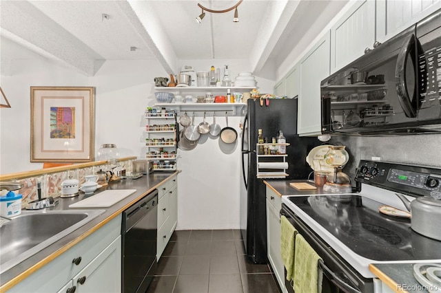 kitchen with white cabinetry, tasteful backsplash, dark tile patterned flooring, black appliances, and a textured ceiling