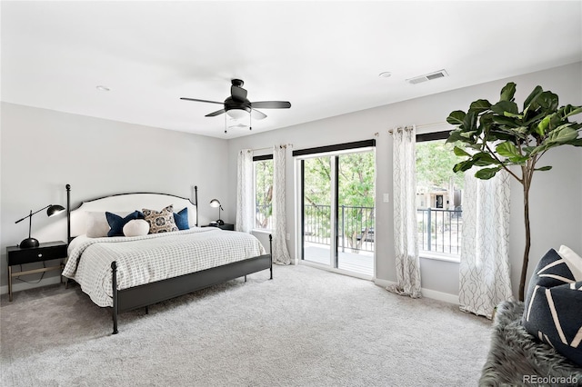 bedroom with access to exterior, visible vents, baseboards, carpet flooring, and a ceiling fan