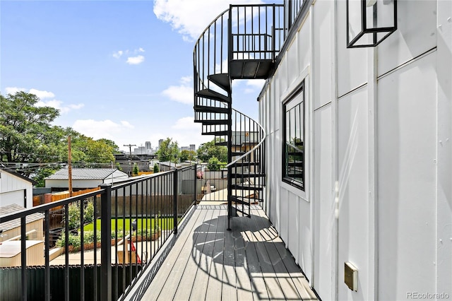 wooden deck featuring stairs