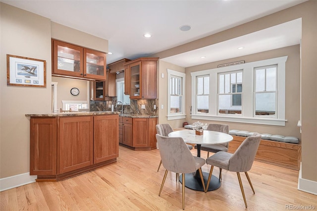 726 S Corona St, Denver, CO 80209 - dining room with light wood-style flooring, recessed lighting, and baseboards