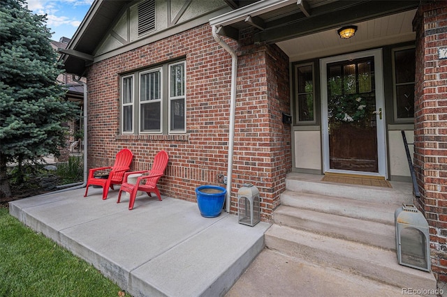 726 S Corona St, Denver, CO 80209 - view of exterior entry with brick siding