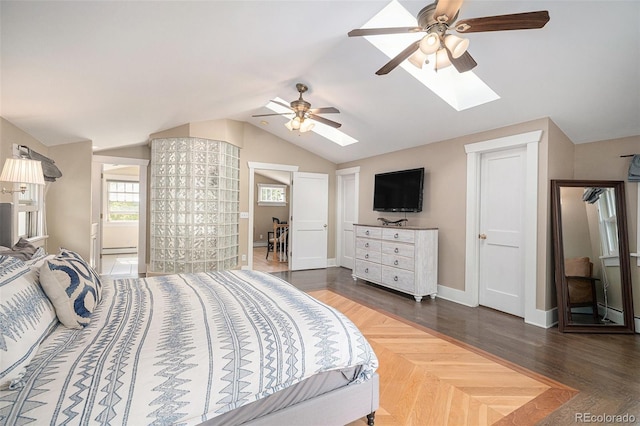 726 S Corona St, Denver, CO 80209 - bedroom with a skylight, vaulted ceiling, baseboards, wood finished floors, and a ceiling fan