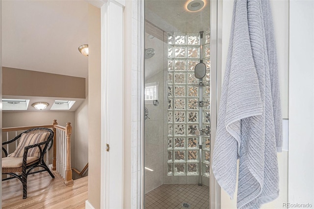 726 S Corona St, Denver, CO 80209 - bathroom with a stall shower and wood finished floors