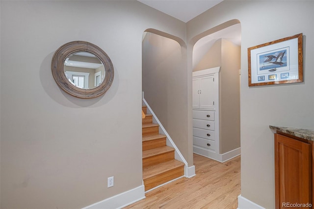 726 S Corona St, Denver, CO 80209 - stairway featuring wood finished floors and baseboards