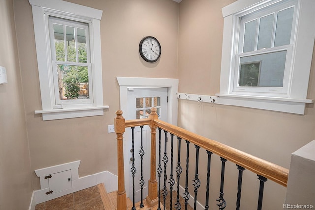726 S Corona St, Denver, CO 80209 - stairs with baseboards and tile patterned flooring