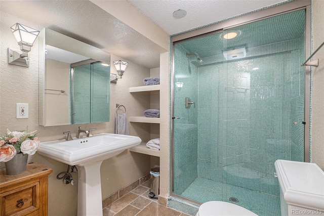 726 S Corona St, Denver, CO 80209 - full bathroom with a stall shower, toilet, a textured ceiling, and baseboards