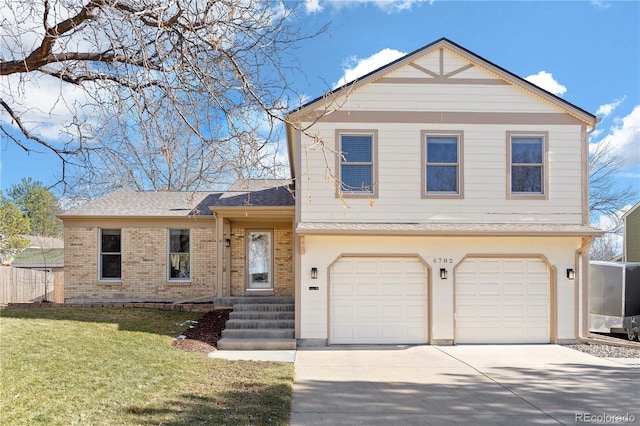 tri-level home featuring brick siding, an attached garage, fence, a front yard, and driveway