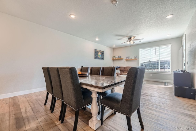 16433 Askins Loop, Parker, CO 80134 - dining space featuring ceiling fan, light wood-type flooring, baseboards, a textured ceiling, and recessed lighting