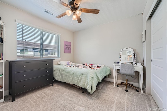 16433 Askins Loop, Parker, CO 80134 - bedroom featuring light colored carpet and ceiling fan