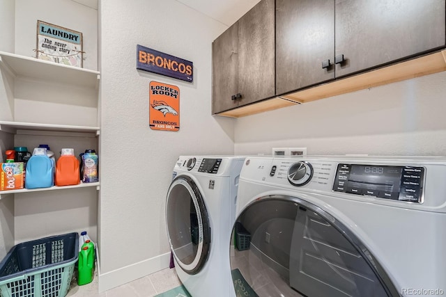 16433 Askins Loop, Parker, CO 80134 - washroom with cabinet space, washer and clothes dryer, and baseboards