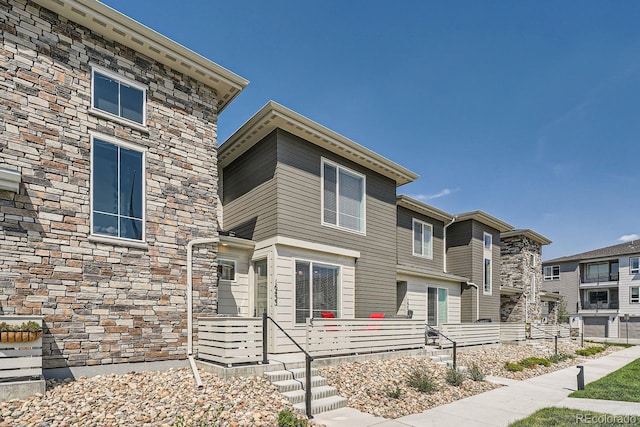 16433 Askins Loop, Parker, CO 80134 - view of front facade featuring stone siding