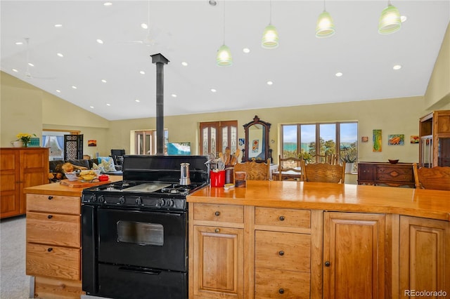 kitchen with hanging light fixtures, high vaulted ceiling, black gas range, open floor plan, and recessed lighting