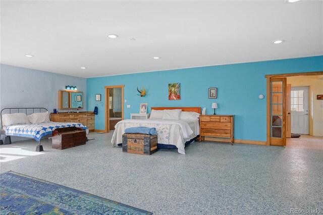 bedroom with recessed lighting and baseboards