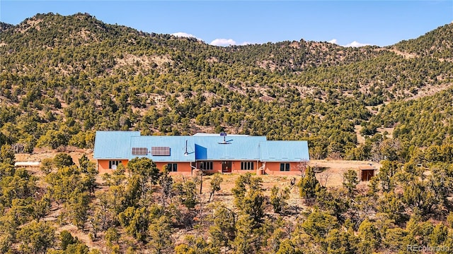 property view of mountains with a view of trees