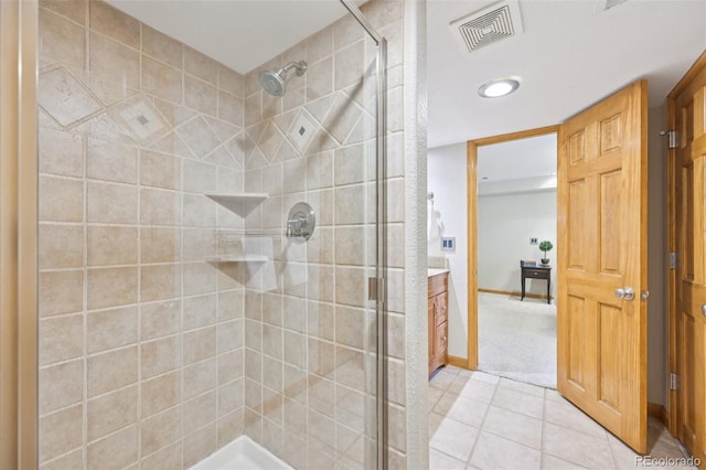 5528 S Jasper Way, Centennial, CO 80015 - bathroom featuring a shower stall, tile patterned flooring, and vanity
