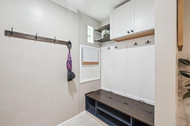 2664 Forest St, Denver, CO 80207 - mudroom featuring baseboards
