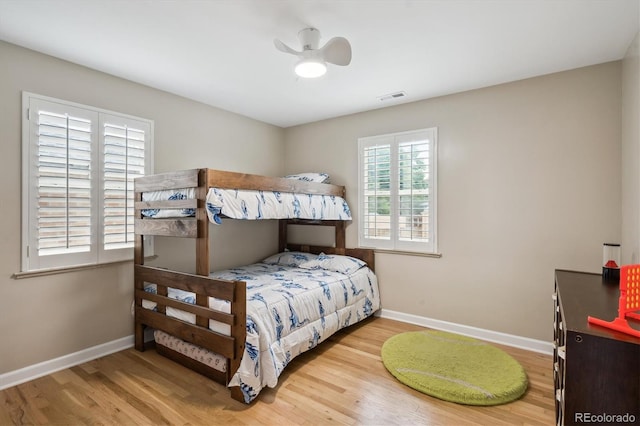 2664 Forest St, Denver, CO 80207 - bedroom with baseboards and wood finished floors