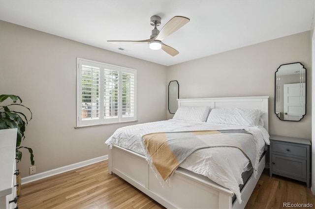 2664 Forest St, Denver, CO 80207 - bedroom featuring light wood-style floors, baseboards, and ceiling fan