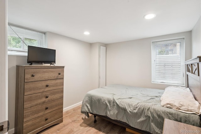 2664 Forest St, Denver, CO 80207 - bedroom with light wood-style flooring, recessed lighting, and baseboards