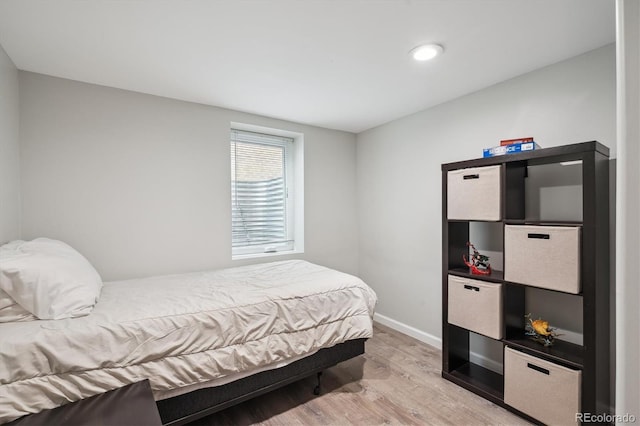 2664 Forest St, Denver, CO 80207 - bedroom featuring light wood finished floors, baseboards, and recessed lighting