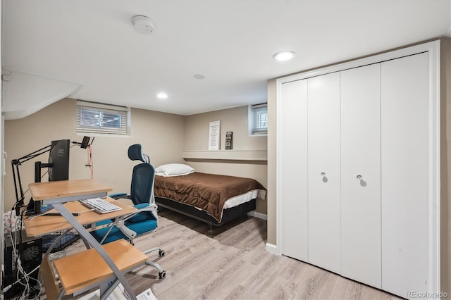2664 Forest St, Denver, CO 80207 - bedroom with wood finished floors, a closet, baseboards, and recessed lighting