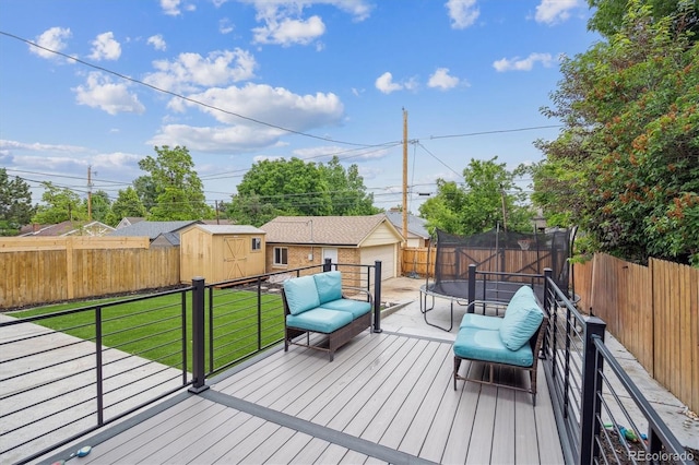 2664 Forest St, Denver, CO 80207 - wooden deck featuring a trampoline