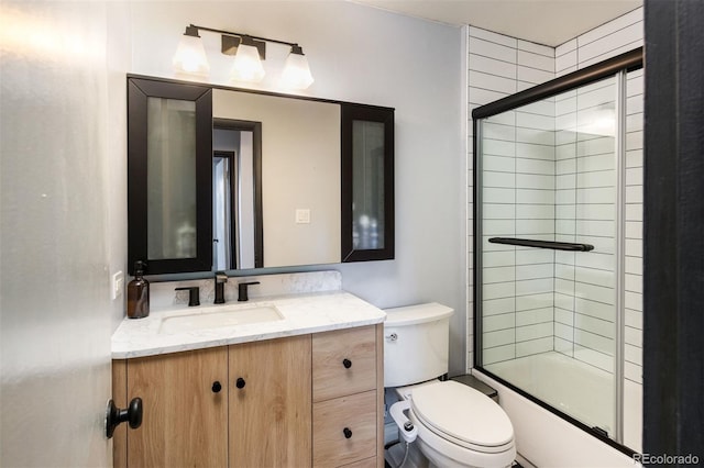 2700 S Holly St Unit 202, Denver, CO 80222 - bathroom featuring vanity and enclosed tub / shower combo