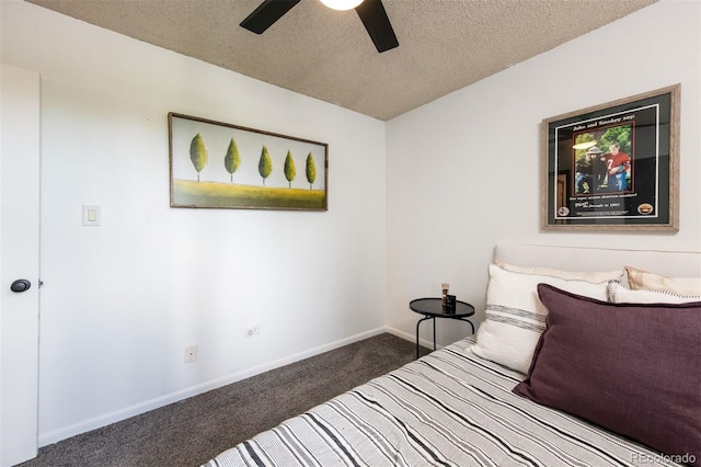 2700 S Holly St Unit 202, Denver, CO 80222 - bedroom featuring carpet floors, a textured ceiling, and ceiling fan
