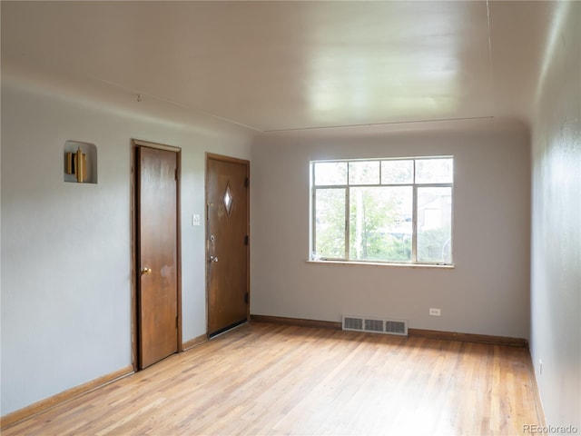 3820-3830 Pierce St, Wheat Ridge, CO 80033 - unfurnished room featuring light wood finished floors and baseboards