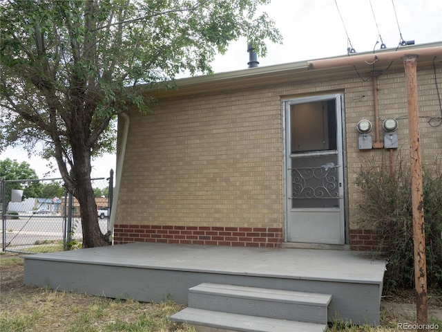 3820-3830 Pierce St, Wheat Ridge, CO 80033 - view of exterior entry with brick siding