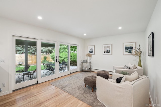632 Wyoming St, Golden, CO 80403 - living room with wood finished floors, recessed lighting, a baseboard radiator, and baseboards