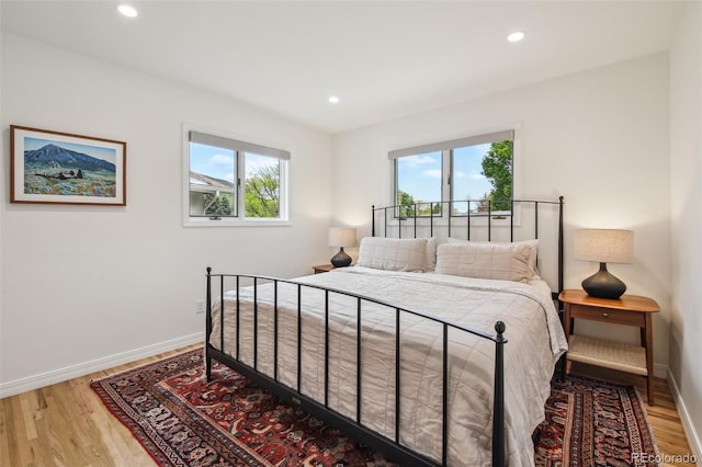 632 Wyoming St, Golden, CO 80403 - bedroom featuring baseboards, light wood-style floors, and recessed lighting