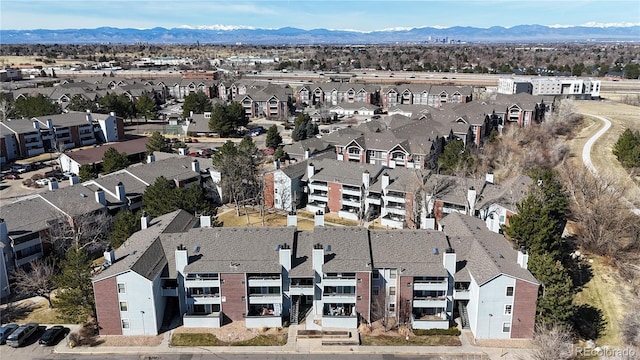 aerial view with a mountain view and a residential view