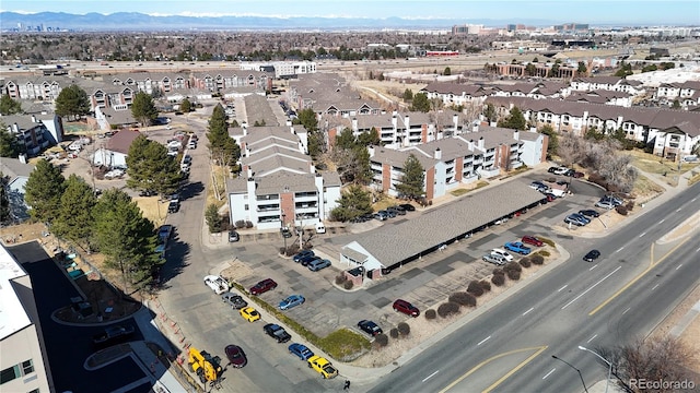 drone / aerial view with a mountain view and a residential view